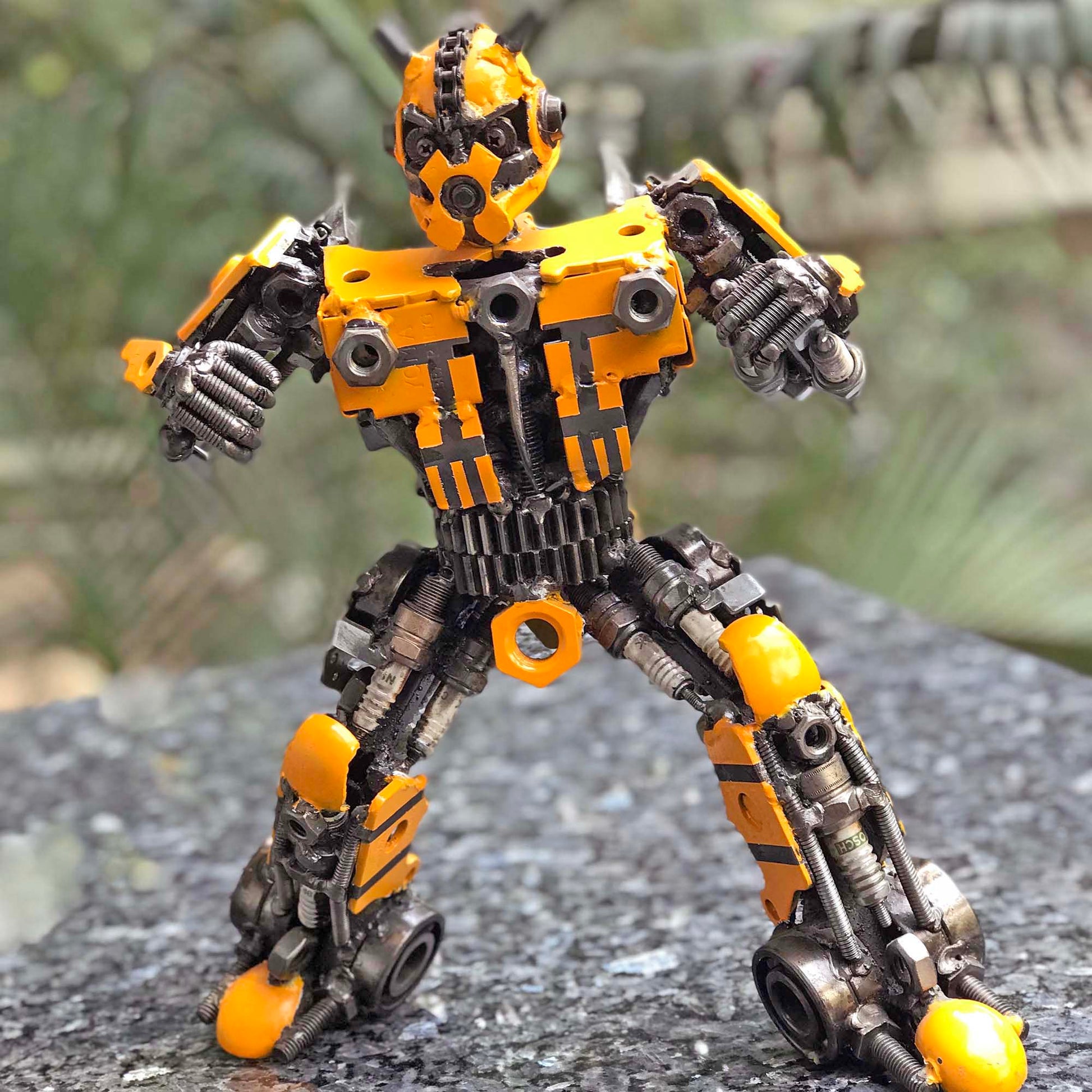 Transformers Bumblebee metal action figure hand-crafted from junk auto parts with attention to detail