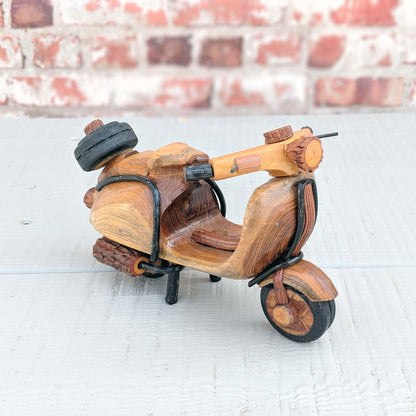 Miniature Vespa scooter hand-crafted from wood