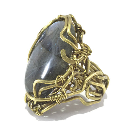 Hancrafted ring with brass wire and labrodorite stone