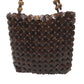 Hand-bag made from recycled coconut shells
