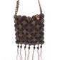 Sling bag hand-crafted from coconut shells