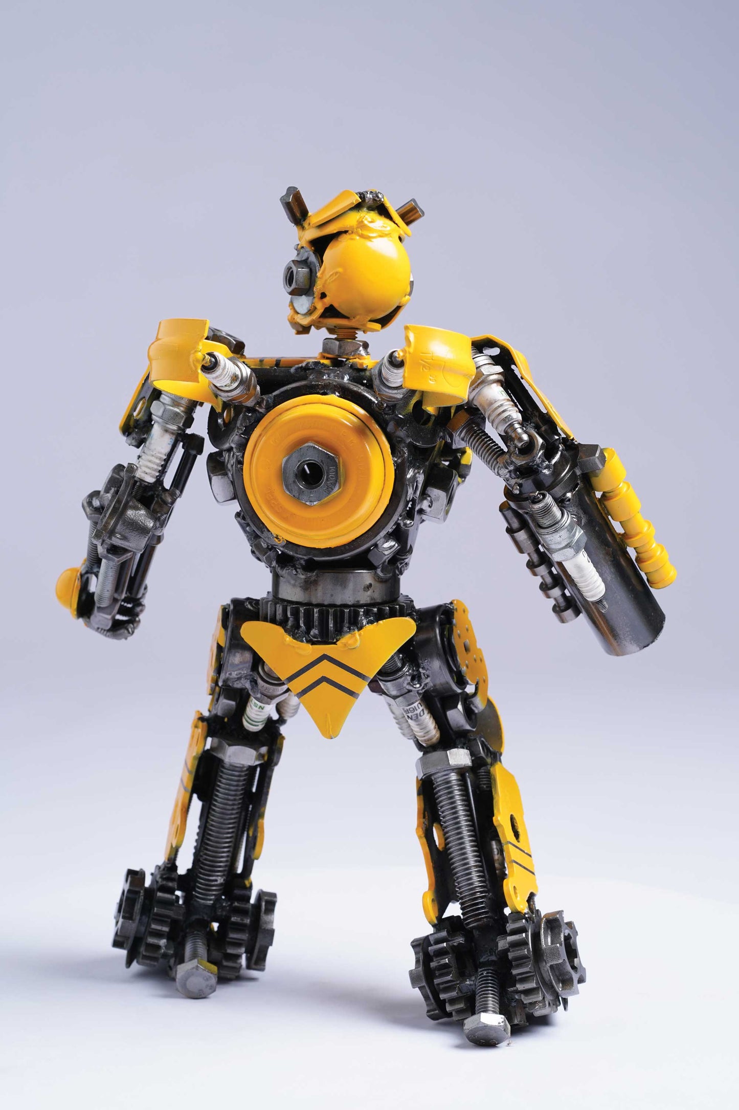 Transformers Bumblebee metal action figure hand-crafted from junk auto parts with attention to detail