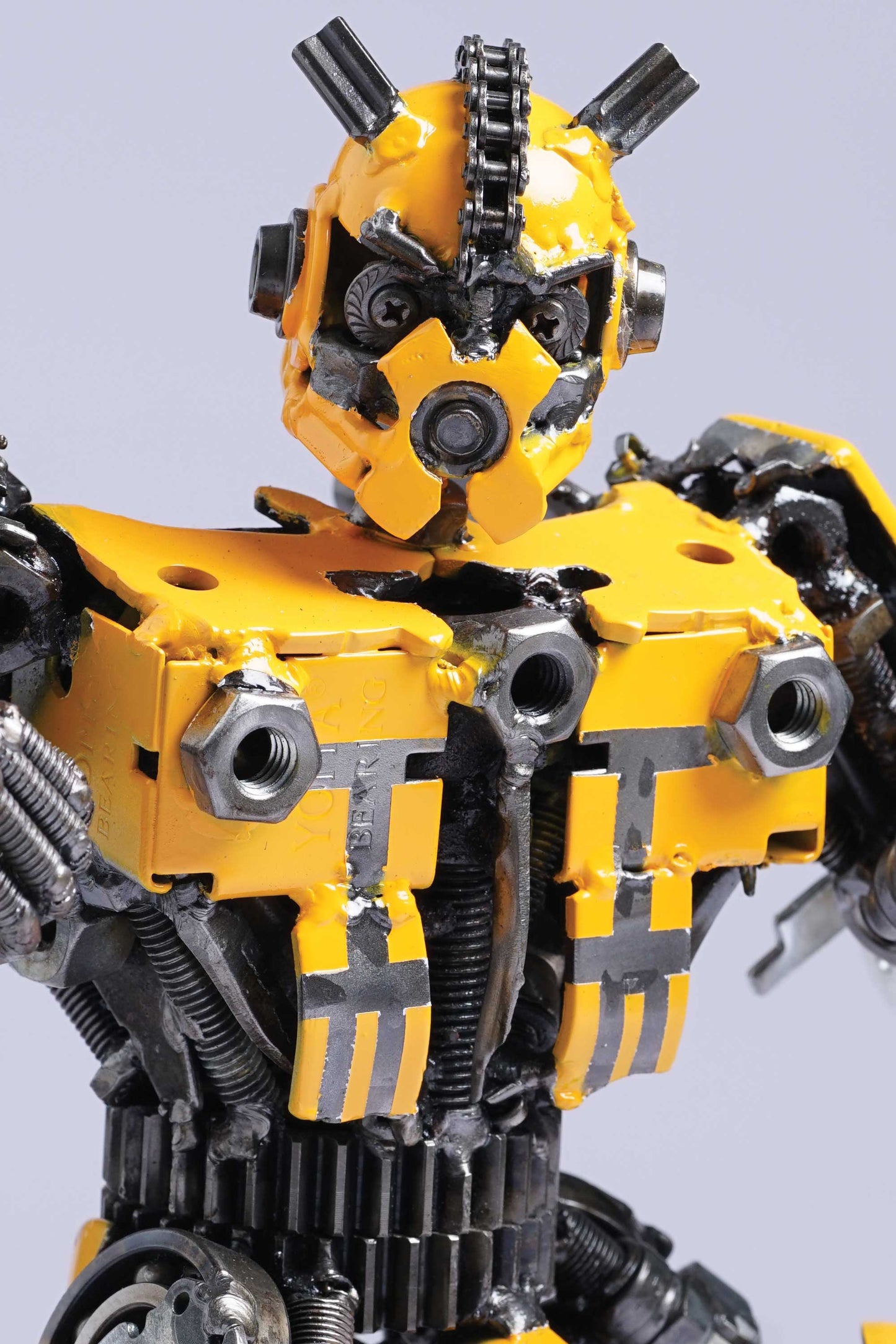 Transformers Bumblebee metal action figure hand-crafted from junk auto parts with attention to detail