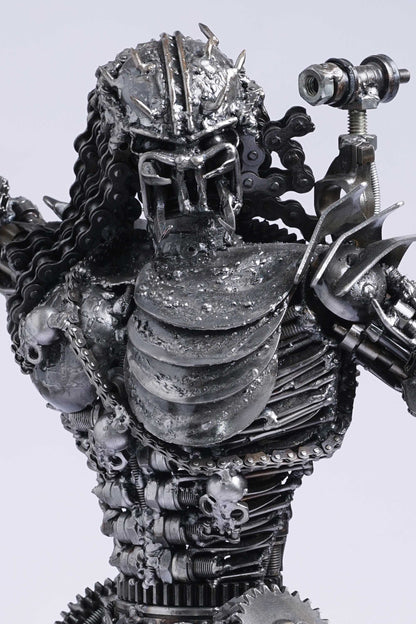 Predator metal action figure hand-crafted from junk auto parts