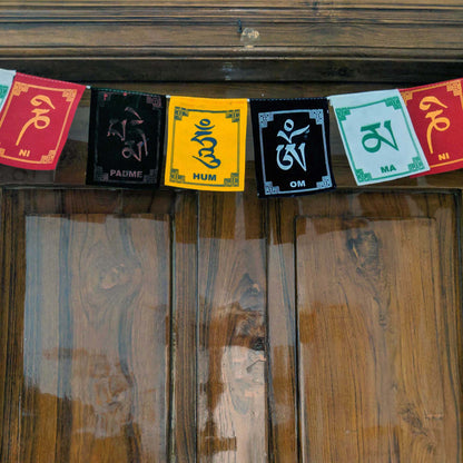 Prayer Flag Om Mani Padme Hum Velvet on home door closeup